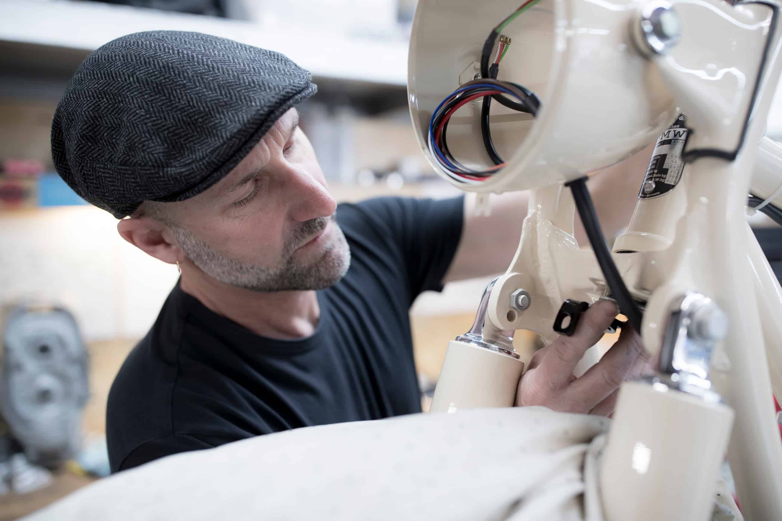 Tim Stafford, of Stafford Restorations, works on an R69S